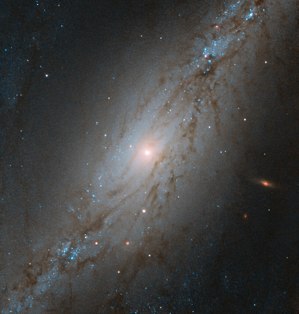 Спіральна галактика NGC 7513, що віддаляється від нас зі швидкістю 1564 кілометрів в секунду. Credit: ESA / Hubble & NASA, M. Stiavelli  