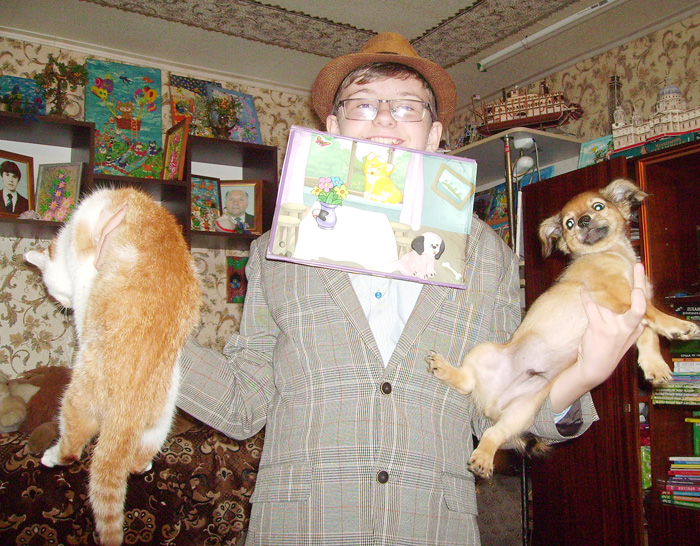 Улюбленці Дмитра — кішка Аліса і песик Вінсент — у житті та на картині. Фото автора