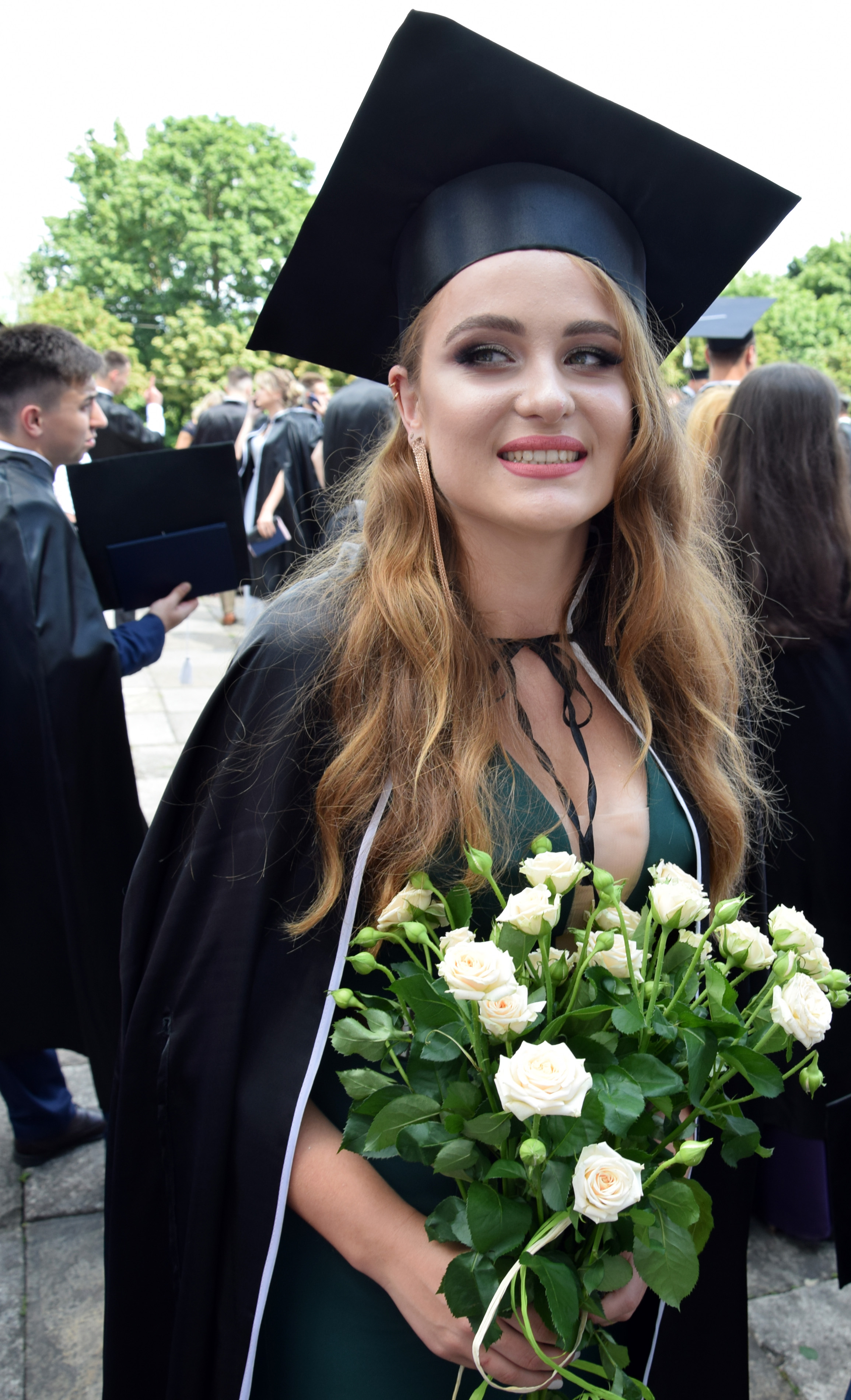 У посмішці випускниці ТНМУ Наталії Кріль відчутна і радість випускного свята, і смуток прощання зі студентськими роками. Фото автора